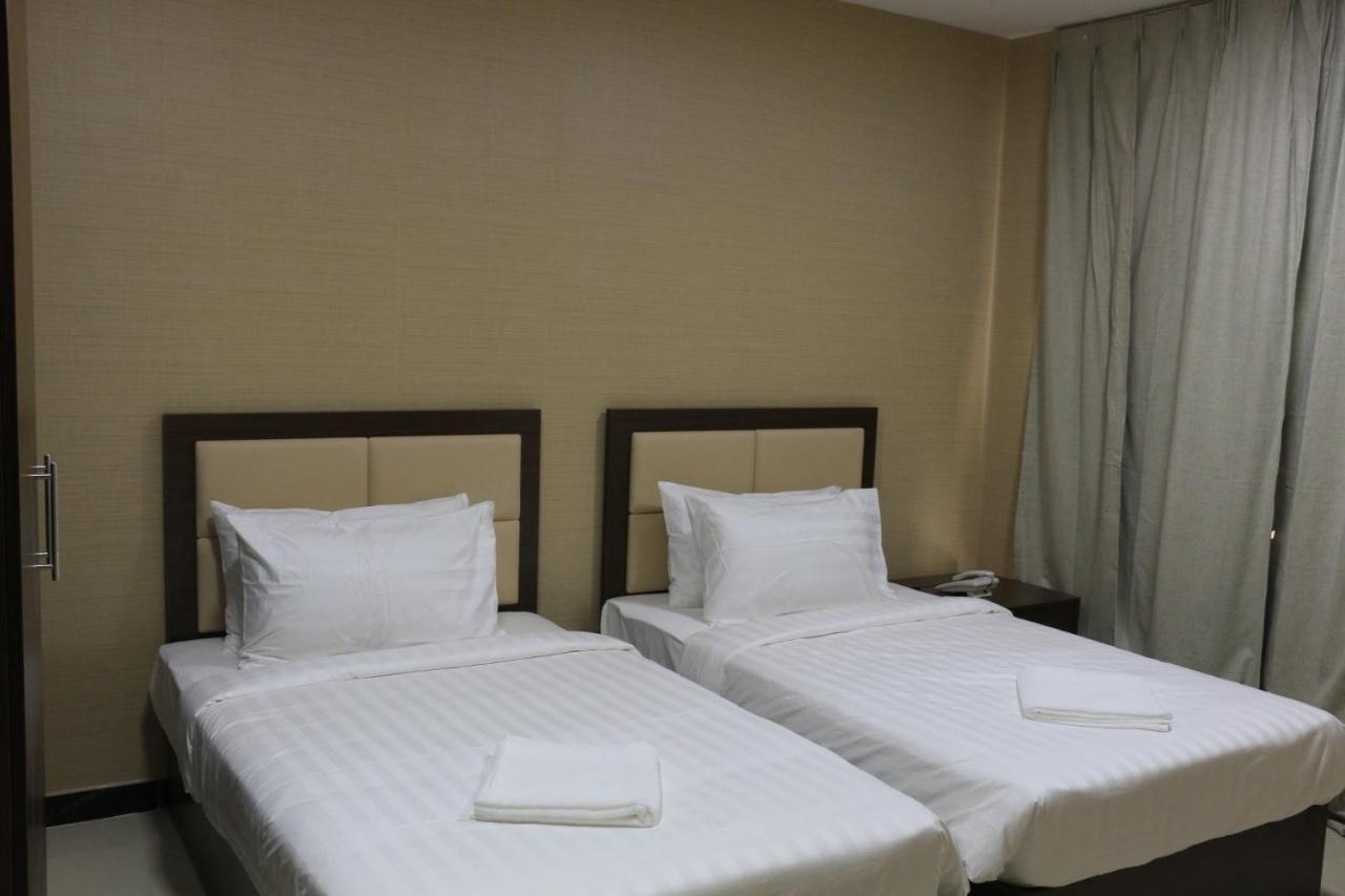 Alpha Suites Hotel Салала Экстерьер фото