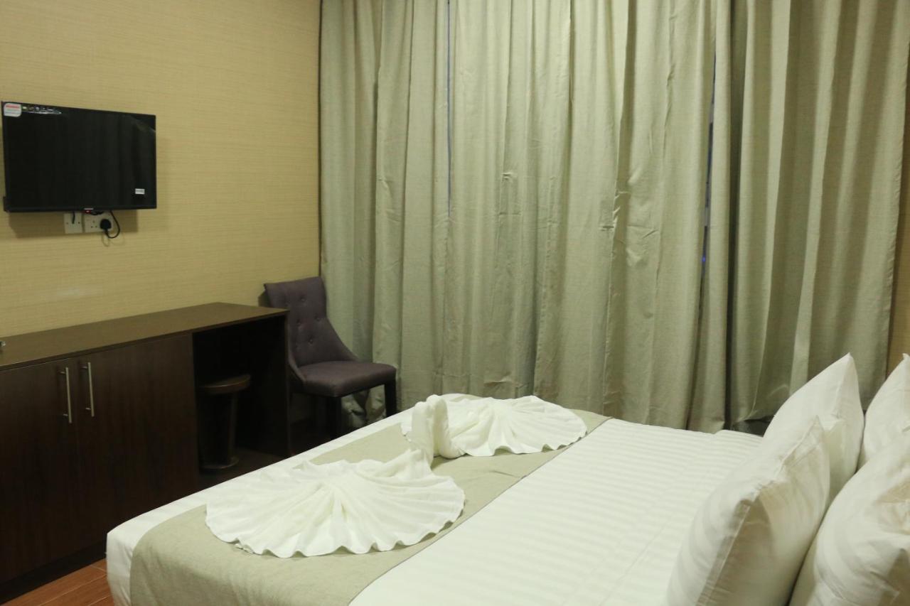 Alpha Suites Hotel Салала Экстерьер фото