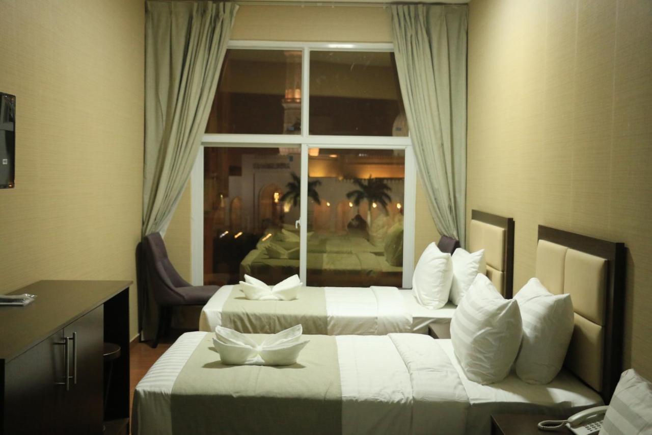 Alpha Suites Hotel Салала Экстерьер фото